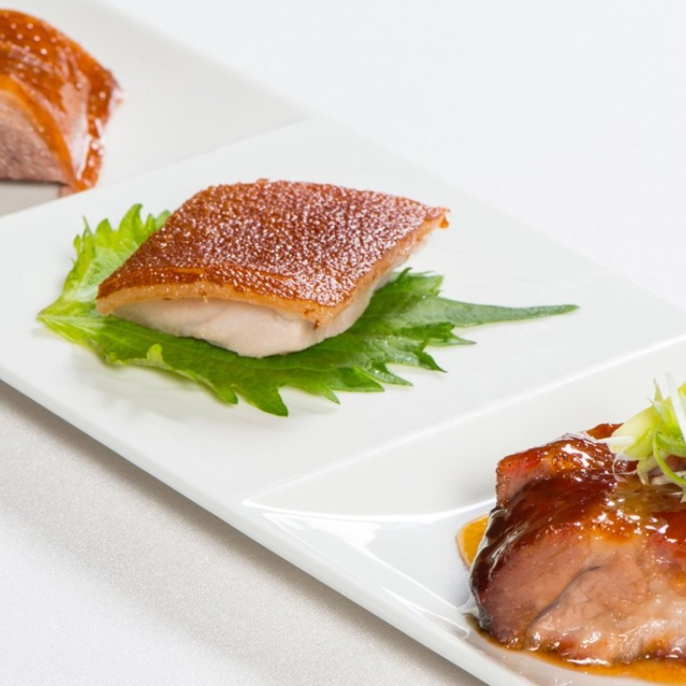 Lung King Heen’s appetiser of suckling pig, barbecued pork with honey and roast goose with plum sauce helped it retain its three Michelin stars.