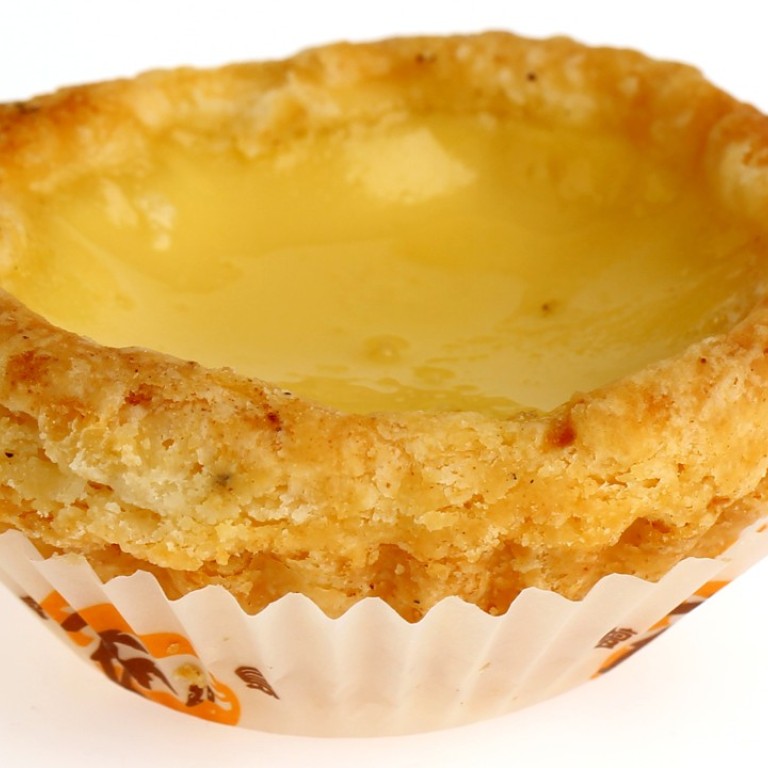 Traditional Hong Kong-style egg tarts use lard to make the flaky pastry, which gives them their distinctive multilayered, melt-in-the-mouth crust.