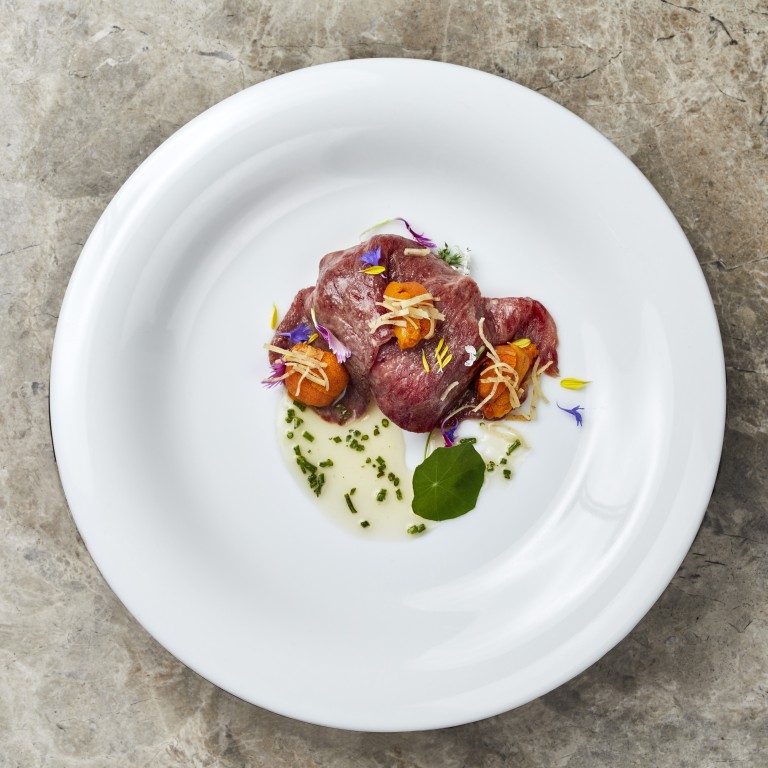 Chef Bryan Nagao’s pipikaula – carpaccio-like air-dried beef – is served with uni, crispy taro and warm dashi sauce.