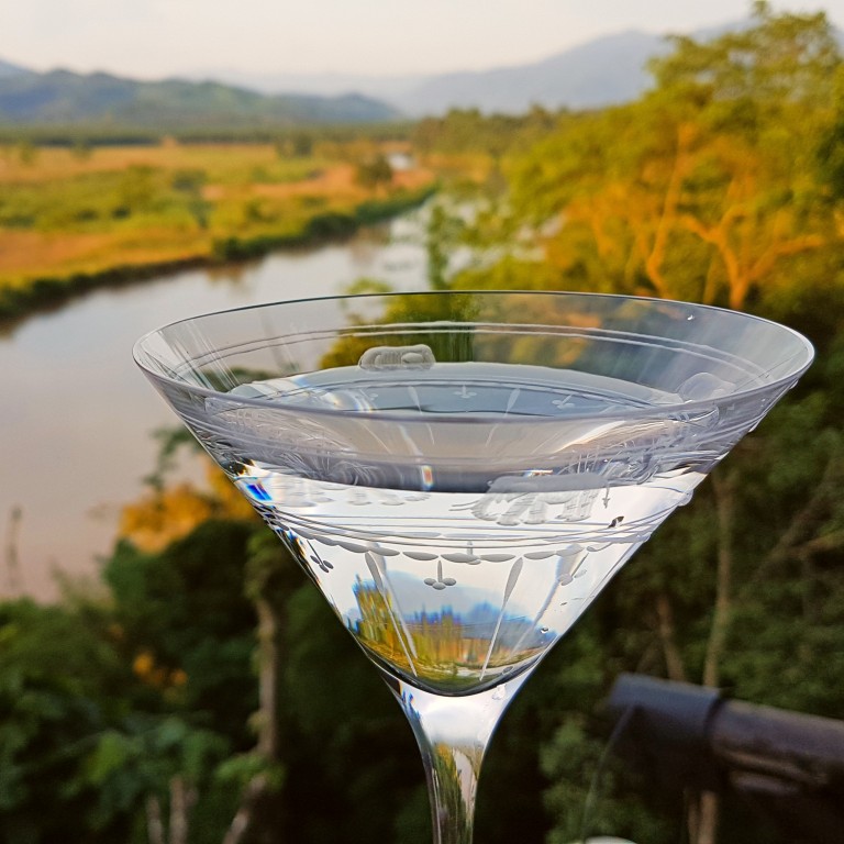 A tent with a view – and a cocktail – looking out across the bamboo jungle, home to rescued elephants, at Four Seasons Tented Camp Golden Triangle, in Thailand. Photos: Cedric Tan