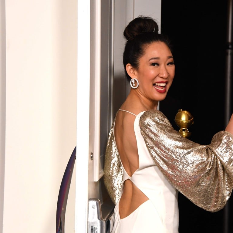Golden Globes host Sandra Oh poses with her own trophy for best actress in a television drama for her role in ‘Killing Eve’ at the 76th annual Golden Globes in Beverly Hills, California. Photo: AFP