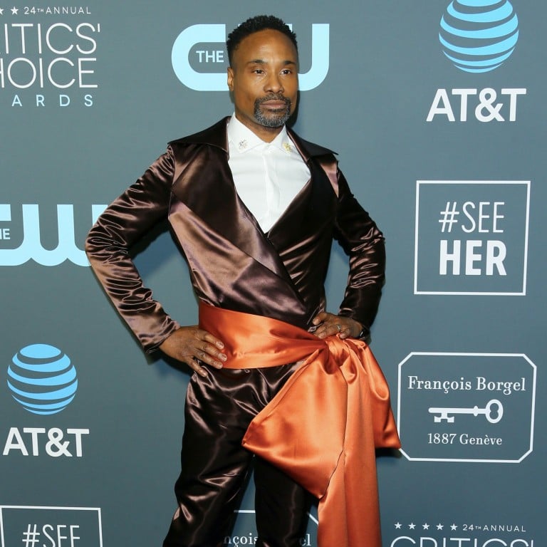 Billy Porter could have done with taking a look in the mirror before setting off from home wearing an orange satin belt. Photo: AFP