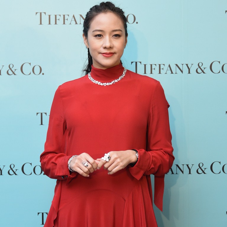 Karena Lam looks festive in red at Tiffany’s waterfront party.
