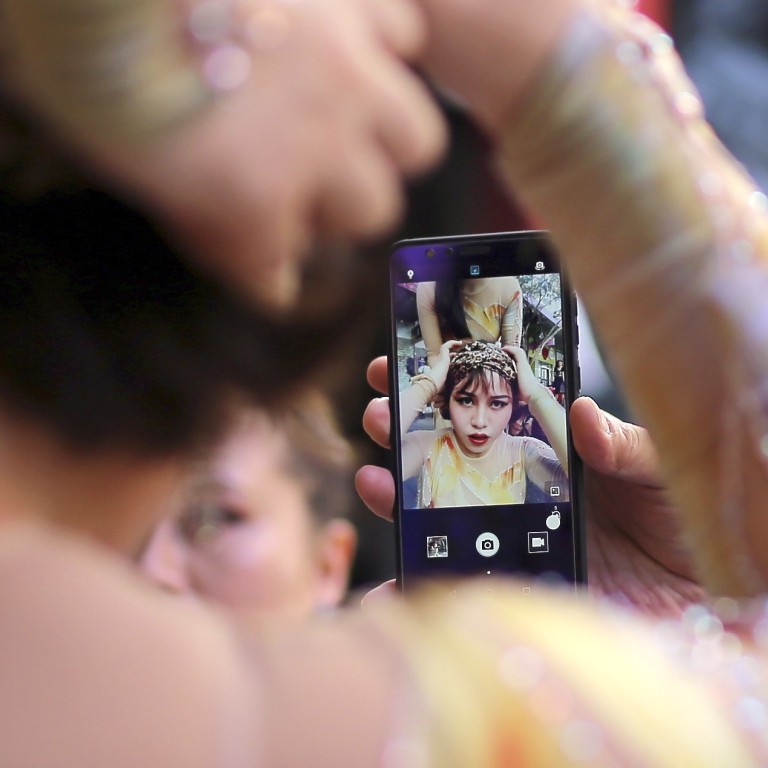Many people choose a smartphone based on the quality of the images produced by its camera. Photo: EPA-EFE
