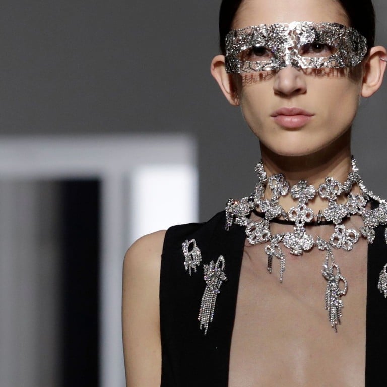 Sparkling accessories, pearly bustiers and soft feathers embellished Clair Waight Keller’s designs for Givenchy haute couture at Paris Fashion Week. Photo: AFP