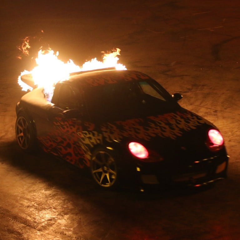 A car is set on fire in ‘Elekron’, Studio City’s new stunt show. Photos: Jeff Chen