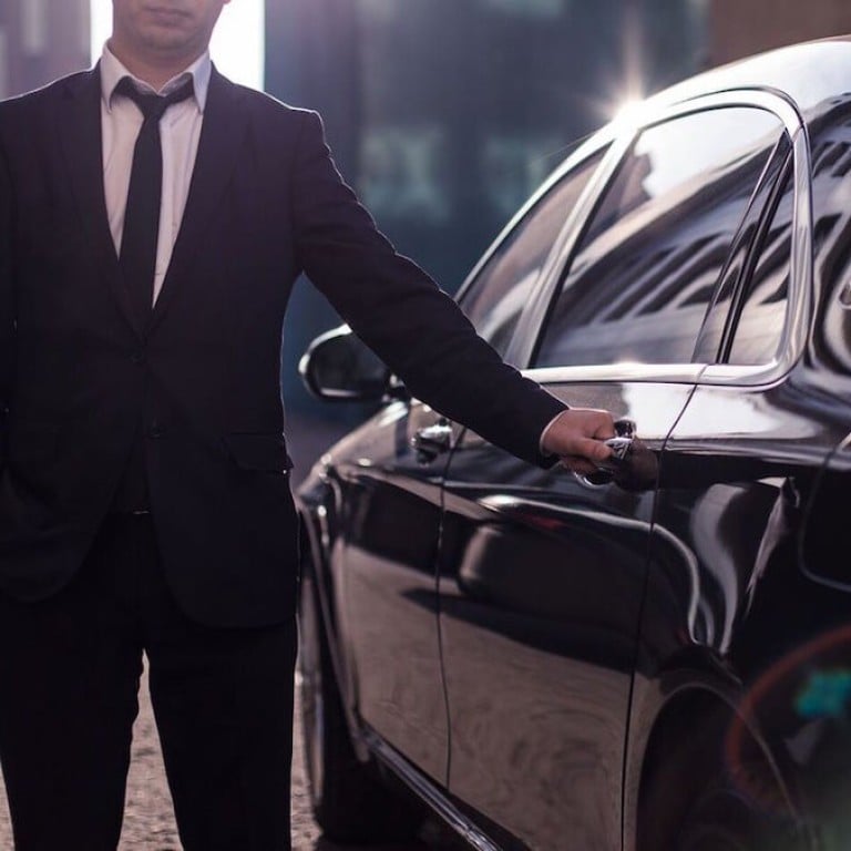 Wheely drivers follow a code of conduct, which includes wearing a suit and tie and opening the door for passengers. Photo: Wheely