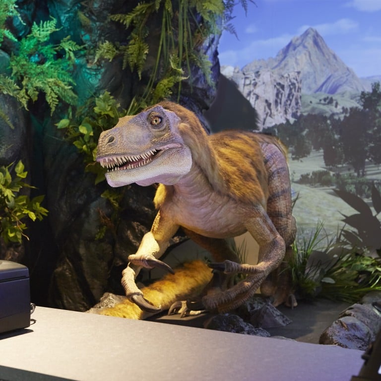 Henn-na Tokyo hotel’s dinosaur at the reception desk is programmed to speak the language of guests when they check in.