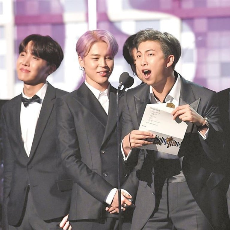 South Korean band BTS presents the award for Best R&B Album at the 61st Grammy Awards in Los Angeles. Photo: AFP-Yonhap