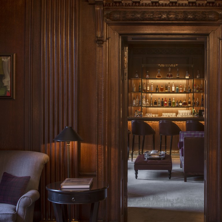 The Club at the Four Seasons London is wood-panelled, with quiet nooks and sofas beside roaring fires.