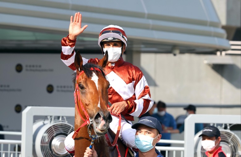 Karis Teetan celebrates after winning aboard Sight Success at Sha Tin. Photo: HKJC