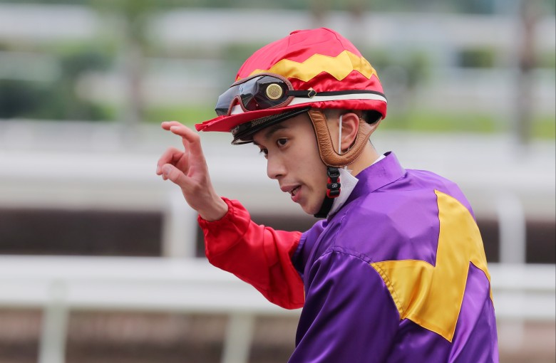 Angus Chung celebrates his first Hong Kong double at Sha Tin on Saturday. Photo: Kenneth Chan