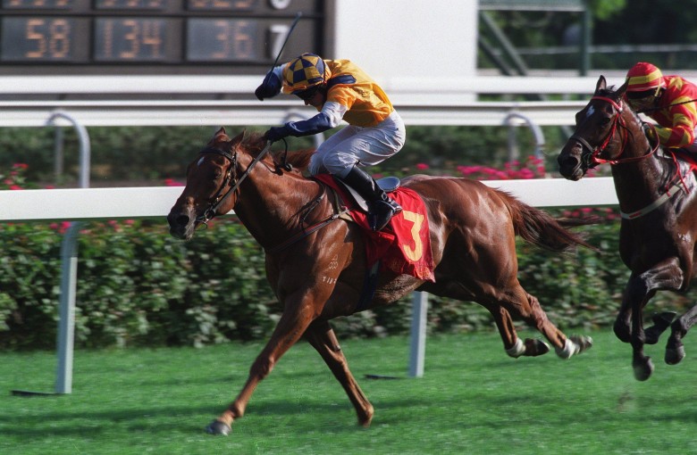 Charming City extends under Shane Dye to win the 2001 Classic Mile at Sha Tin. Photo: Oliver Tsang