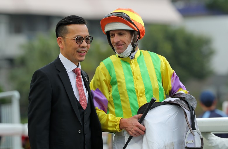 Trainer Frankie Lor and jockey Hugh Bowman celebrate Sword Point’s Class Three win at Sha Tin on January 8. Photo: Kenneth Chan