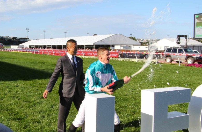 Trainer Danny Shum and jockey James McDonald celebrate in the aftermath of Romantic Warrior’s Cox Plate victory. Photo: Kenneth Chan