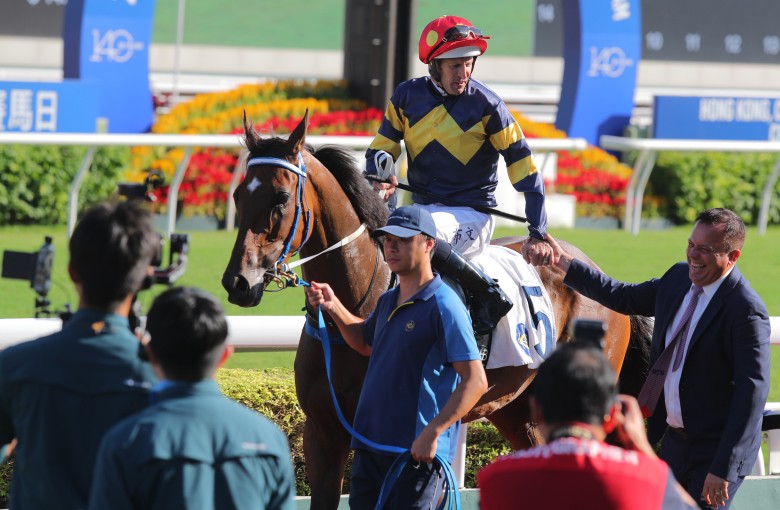 Hugh Bowman and Caspar Fownes celebrate Family Jewel’s latest win at Sha Tin. Photos: Kenneth Chan