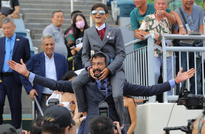Owner Roshan Melwani celebrates Karma’s victory with his son. Photos: Kenneth Chan