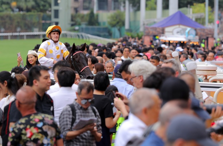 Luke Ferraris among the Happy Valley fans after winning aboard Smart Fighter on Sunday. Photos: Kenneth Chan