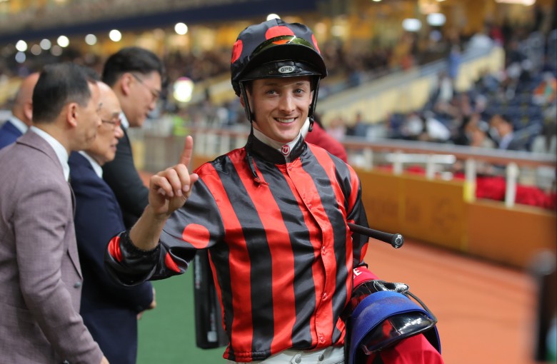 Harry Bentley soaks up his 100th Hong Kong winner at Happy Valley on Wednesday night. Photos: Kenneth Chan