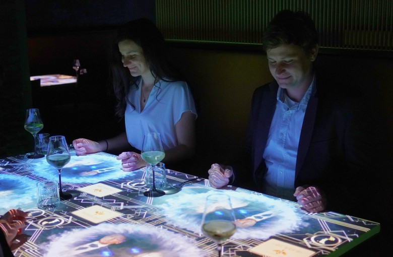 Guests enjoy a show with their meal at The Magic Table experience at the Grand Hyatt Hong Kong. Photo: Handout