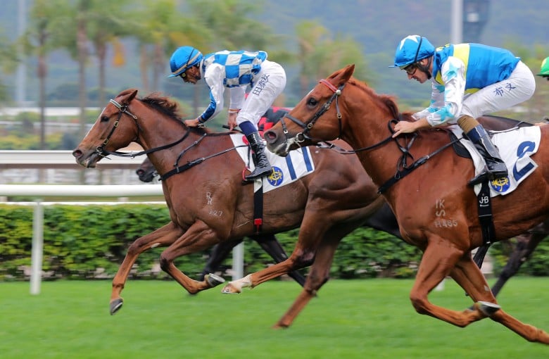 Storm Rider surges home to win the Chinese Club Challenge Cup under Karis Teetan. Photos: Kenneth Chan