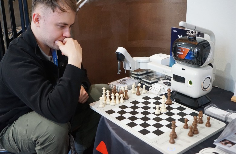 A man plays chess with an AI-powered chess robot at the exhibition area of Chinese company SenseRobot at a pre-show event of the 2026 Consumer Electronics Show (CES) in Las Vegas, US, on January 5. Photo: Xinhua