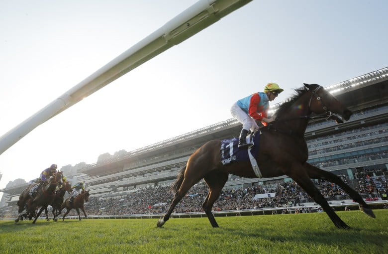 Ka Ying Rising surges clear to win the Queen’s Silver Jubilee Cup. Photos: Kenneth Chan