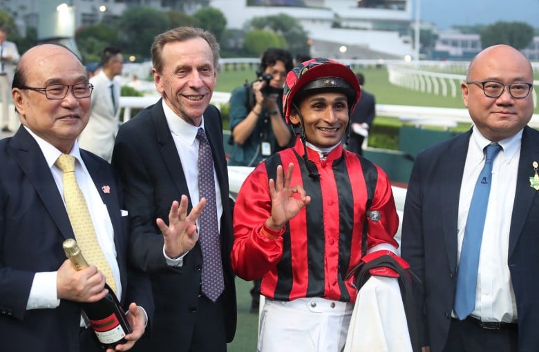 John Size (second left) and Karis Teetan celebrate Nautical Force’s win. Photos: Kenneth Chan