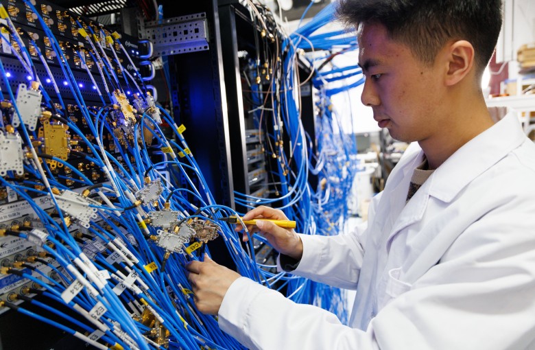 A researcher checks the control wiring at a laboratory in the Institute of Physics, Chinese Academy of Sciences, on January 21. Photo: Xinhua
