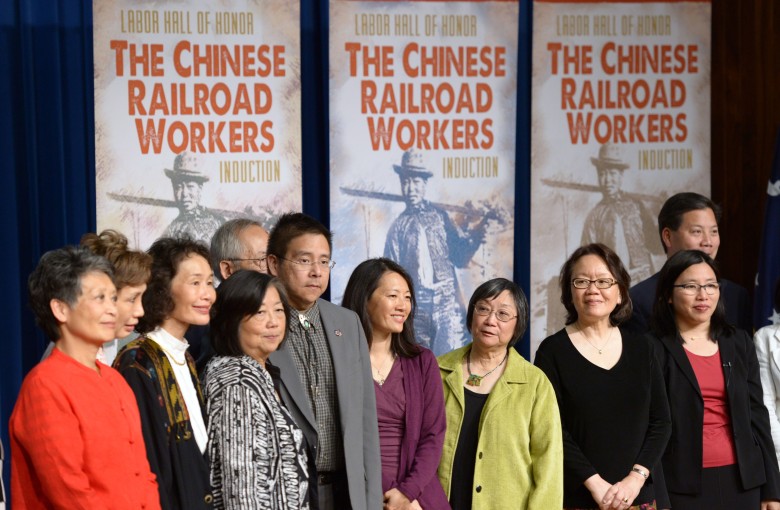 Descendants of Chinese railroad workers gather during a ceremony for 12,000 Chinese immigrant labourers who worked on the Central Pacific Railroad between 1865 and 1869 being inducted into the Labor Hall of Honor, at the Department of Labor, in Washington DC, on May 9, 2014. Photo: Xinhua