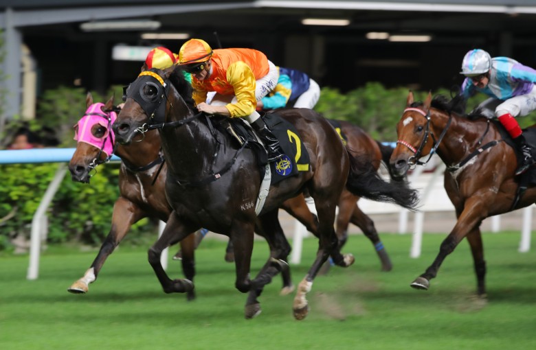 Armor Golden Eagle, ridden by Zac Purton, scores at Happy Valley. Photos: Kenneth Chan