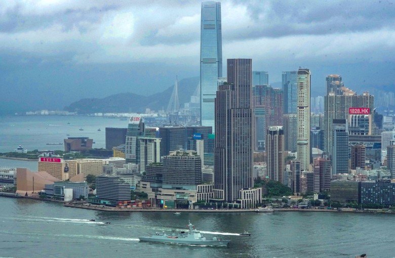 Guided-missile destroyer Nanning departs Hong Kong. Photo: Robert Ng