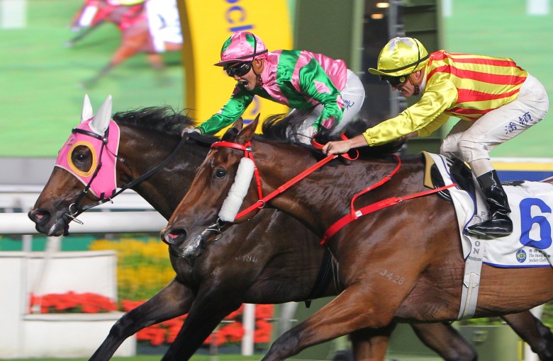 Nichola Yuen (pink) celebrates as she wins on Aeroinvincible at Sha Tin. Photos: Kenneth Chan