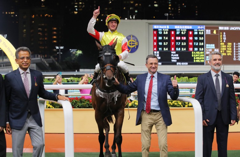 Jockey Zac Purton, trainer Douglas Whyte and connections of Live Wire celebrate his win last month. Photos: Kenneth Chan