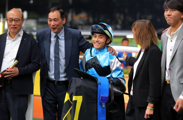 Trainer Michael Chang (second from left) and jockey Keith Yeung celebrate New Power’s win at Happy Valley. Photos: Kenneth Chan