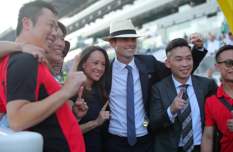 James Cummings (centre) celebrates his first Hong Kong win with wife Monica and stable staff. Photos: Kenneth Chan
