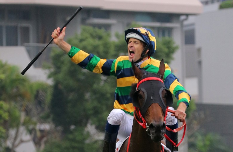 Hugh Bowman screams in delight after winning the BMW Hong Kong Derby with Furore. Photo: Kenneth Chan