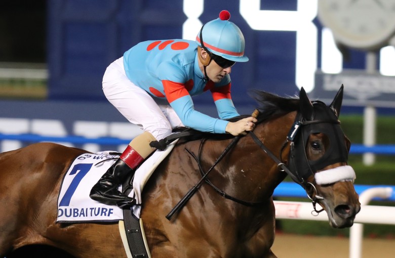 Christophe Lemaire wins the Dubai Turf with Almond Eye at Meydan. Photo: Kenneth Chan