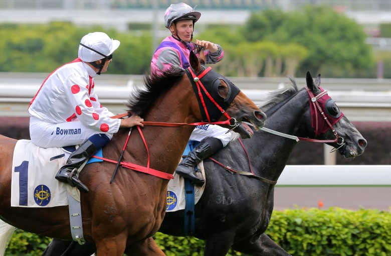 Hugh Bowman and James McDonald have a chat after a race at Sha Tin on Champions Day. Photos: Kenneth Chan