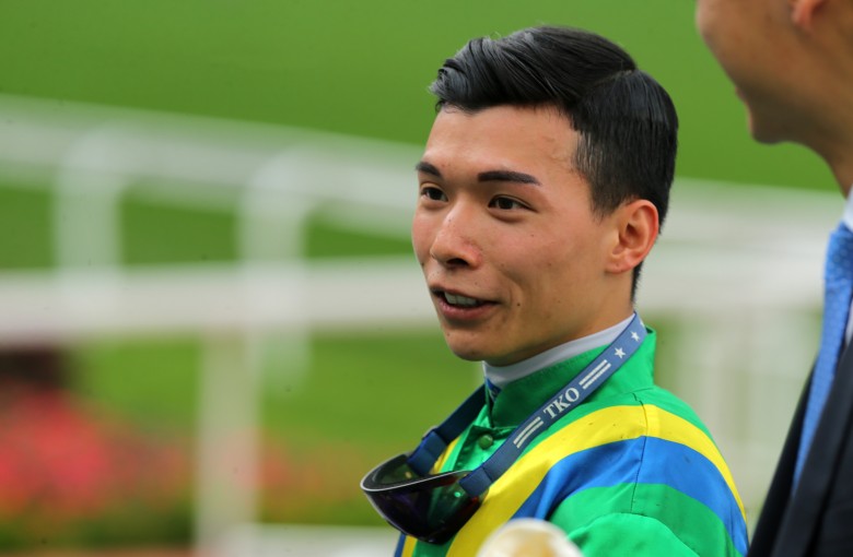 Apprentice Victor Wong returns to scale after riding a winner. Photos: Kenneth Chan