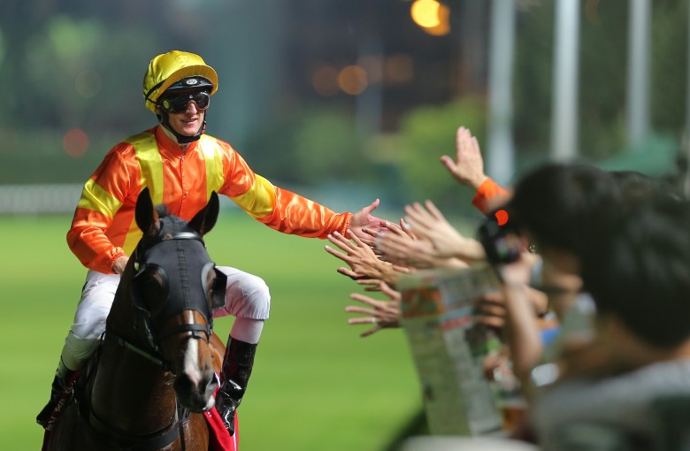 Zac Purton celebrates a winner with fans at Happy Valley earlier this month. Photos: Kenneth Chan