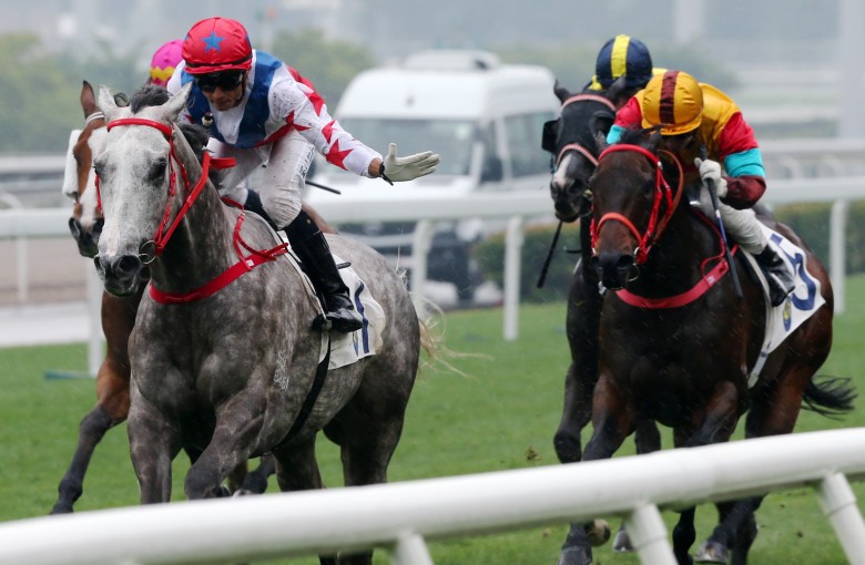 Grant van Niekerk gives Big Party a pat as he cruises to victory in the Group Three Bauhinia Sprint Trophy at Sha Tin on Sunday. Photos: Kenneth Chan