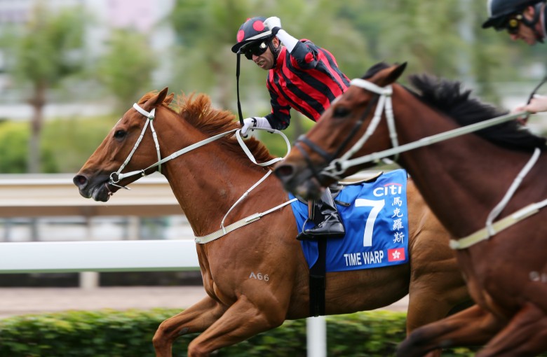 Joao Moreira salutes as Time Warp holds off Exultant in the Group One Citi Hong Kong Gold Cup. Photos: Kenneth Chan