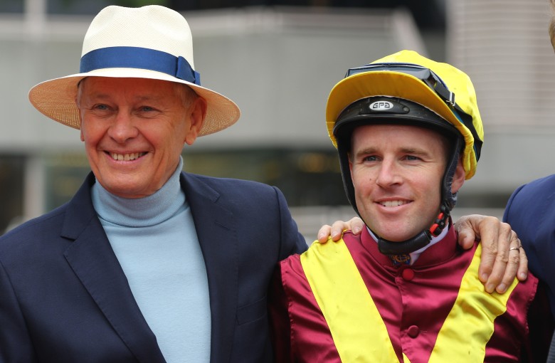 Trainer John Moore with jockey Tommy Berry. Photos: Kenneth Chan