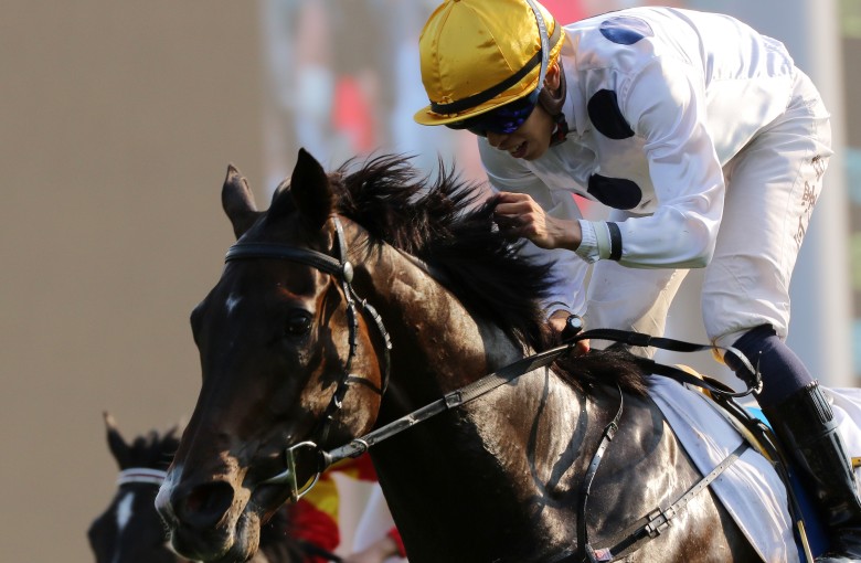 Vincent Ho crosses the line to win the BMW Hong Kong Derby at Sha Tin on Sunday. Photos: Kenneth Chan
