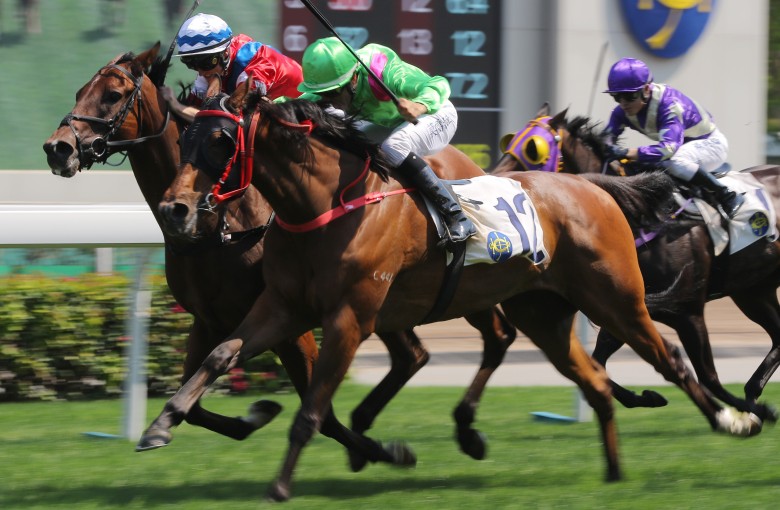 Joao Moreira and Leading Fortune edge out Zac Purton and Party Genius at Sha Tin on Sunday. Photos: Kenneth Chan