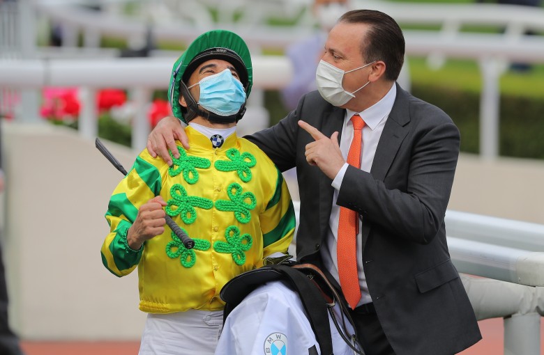 Jockey Joao Moreira and trainer Caspar Fownes celebrate their Derby win with Sky Darci in March. Photo: Kenneth Chan