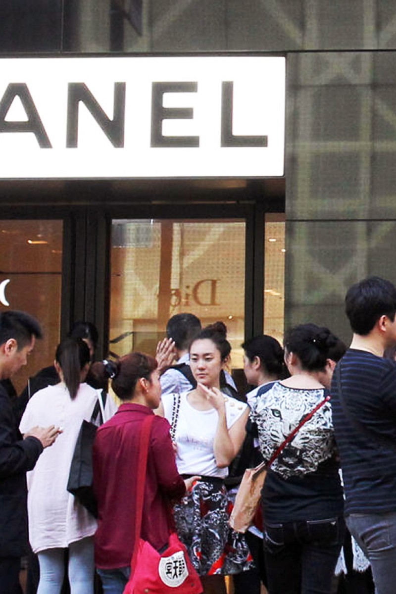More than 100 people queue at Chanel store on Canton Road after a