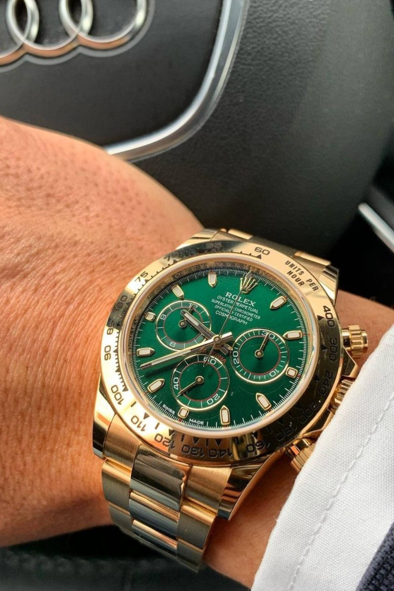 Gold daytona clearance with green dial