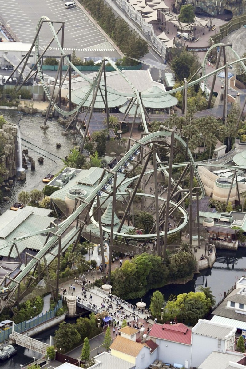 Sixty four roller coaster riders left hanging 100 feet above the